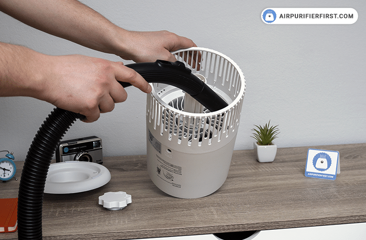 Use a vacuum cleaner and clean the inside of the air purifier to remove dust and other particles inside the device.