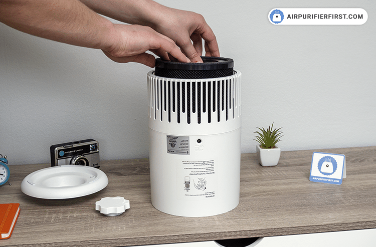 Prepare a new filter and place it inside the air purifier.