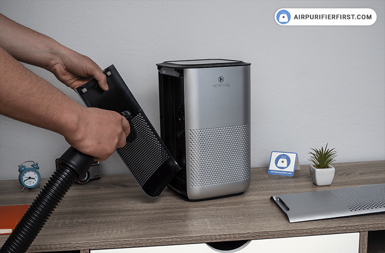 Use a vacuum cleaner on the insides of the air purifier to remove any accumulated dust
