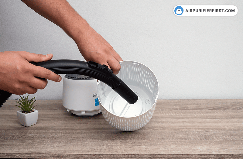 Use a vacuum cleaner to vacuum up any dust accumulated inside